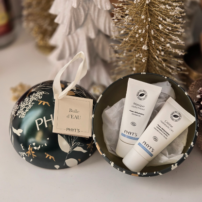 Présentation ouverte du coffret Bulle d’Eau de Phyt's, dévoilant des soins hydratants idéaux pour les peaux déshydratées.