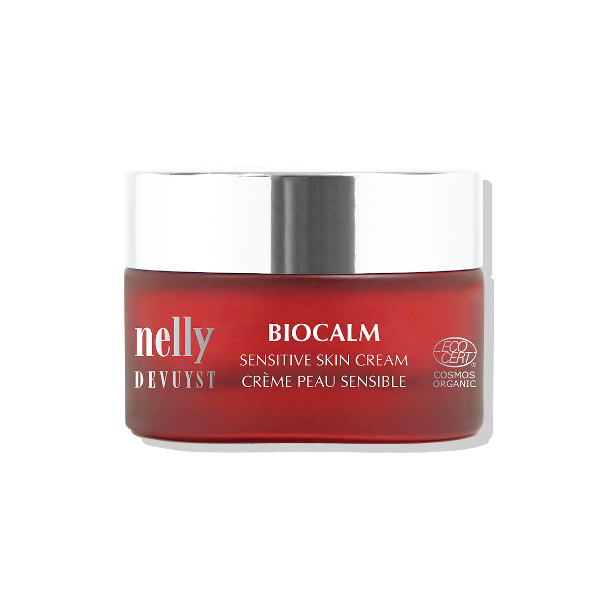 Pot rouge de la Crème BioCalm Nelly DeVuyst, soin apaisant certifié bio formulé pour calmer les rougeurs, réduire la sensibilité et protéger la peau fragile.