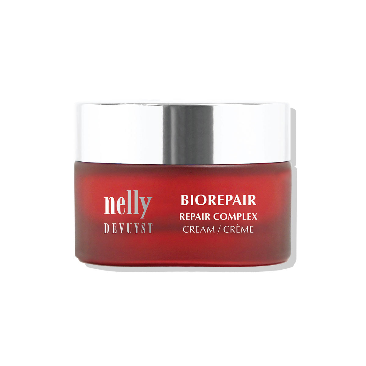Pot rouge de la Crème Complexe BioRepair Nelly DeVuyst, soin réparateur intensif qui favorise la régénération cellulaire et la souplesse de la peau.