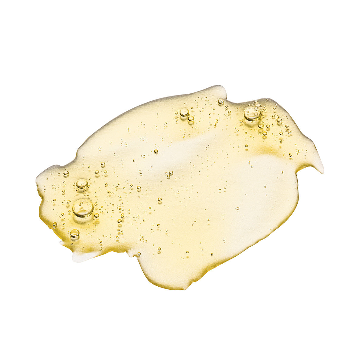 Texture dorée de l’Huile Radiance Mélatonine Nelly DeVuyst, riche en actifs antioxydants et régénérants pour révéler l’éclat naturel de la peau.