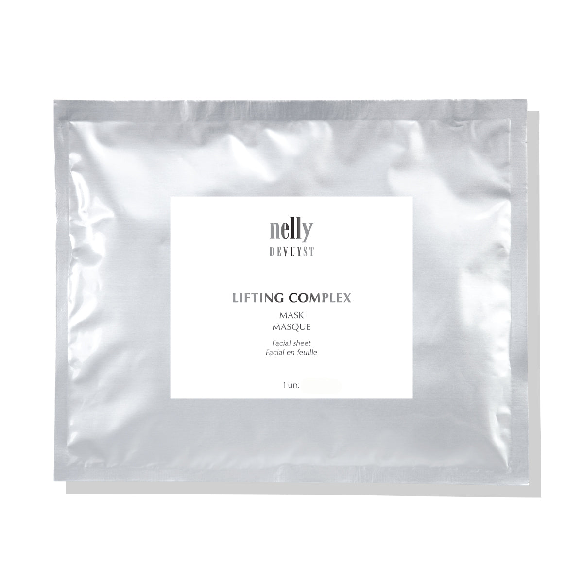 Sachet argenté du Masque Lifting Complex facial en feuille Nelly DeVuyst, soin anti-âge intensif à effet liftant immédiat, idéal pour revitaliser la peau et atténuer les signes du temps.