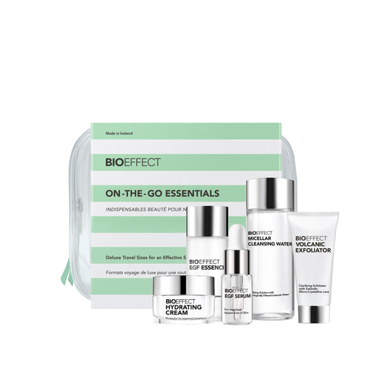 Ensemble de soins Bioeffect en format voyage incluant exfoliant volcanique, eau micellaire, serum EGF, essence et creme hydratante dans un coffret vert et blanc luxueux.