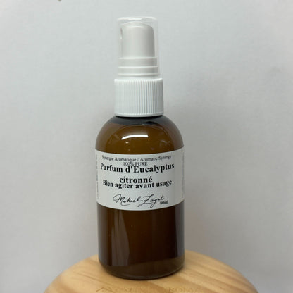 Flacon brun de spray naturel aux huiles essentielles, idéal pour une protection douce et efficace contre les tiques